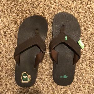 Never worn, brand new Sanuk Brown Sandals